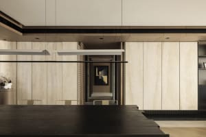 Modern dining room featuring wooden paneling and contemporary design elements.