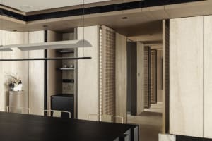 Contemporary residential dining room featuring modern design elements and wood finishes.