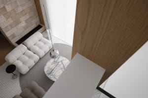 Modern living room with white leather sofas and a marble table, minimalist design.