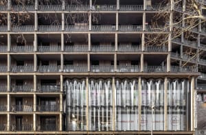 Modern building with metallic balconies and glass facade