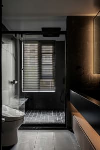 Modern bathroom with marble and glass elements