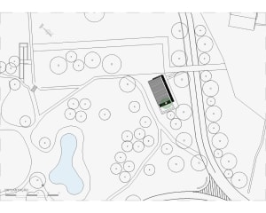 Landscape design blueprint with trees, paths, and green spaces.
