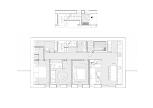 Detailed architectural drawing of a minimalist residential interior with specific room layouts and functional zones.
