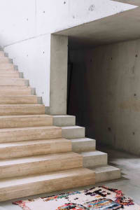 Modern minimalist staircase made of marble and concrete