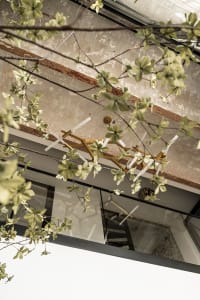 Minimalist design featuring concrete beams in an industrial building interior