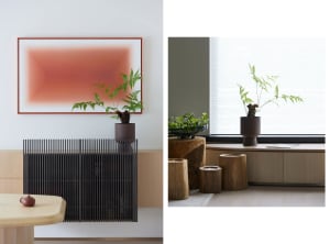 A minimalist interior design featuring modern wooden and metal furniture and decor elements.