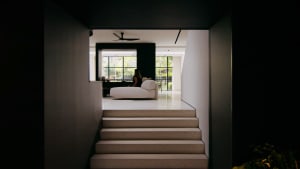 A modern spa interior with a minimalist concrete design