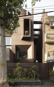 Modern building facade with concrete and glass features.