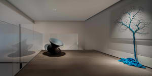 A minimalist art installation featuring a twisted rope structure.