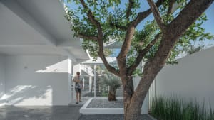 A minimalist interior design featuring stone elements.