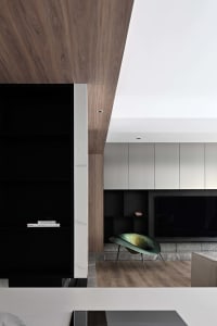 Modern interior design featuring marble elements in a living room setting.