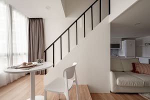 Modern living room featuring neutral colors and minimalist design.