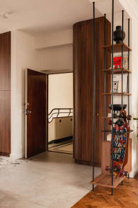 An elegant, modern entryway with wooden elements and a stylish design.