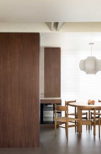 Modern interior design featuring wooden furniture and fixtures.