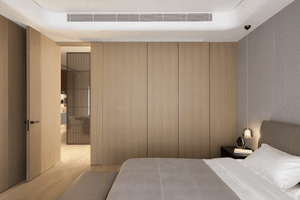 Modern minimalist bedroom featuring wood panels and a cozy atmosphere.