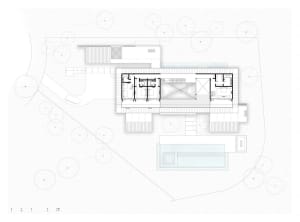 Floor plan of a modern house showcasing a glass interior design.