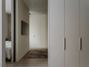 Modern minimalist interior design with neutral tones and sleek lines.