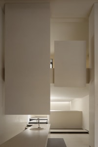 Modern minimalist staircase with concrete and glass elements