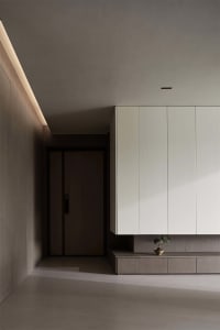Modern minimalist lobby featuring concrete materials.