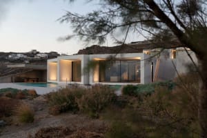Modern residential architecture with concrete and glass materials.