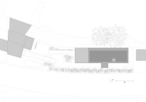 Design plan for a modern residential structure featuring extensive use of glass.