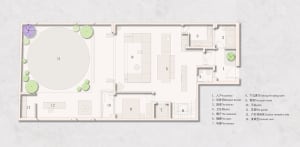Floor plan of a house shown in white and gray colors on a white background with the layout of rooms and spaces.