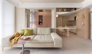 A modern living room with neutral-toned decor and minimalistic design.