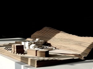 Model of an abstract urban plan constructed from wood and paper.