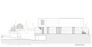 A 2D architectural drawing of a stone exterior house floor plan.