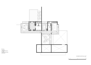 Second floor architectural plan of a modern residential house featuring concrete and glass elements.
