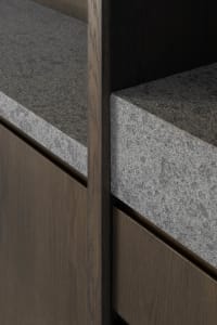 Concrete cabinet detail showcasing sleek, minimalist design with clean lines and texture.