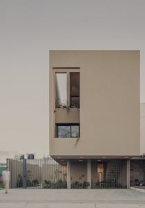 Modern residential building with sandstone exterior