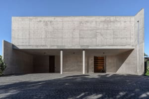 Modern concrete box house with简约线条设计