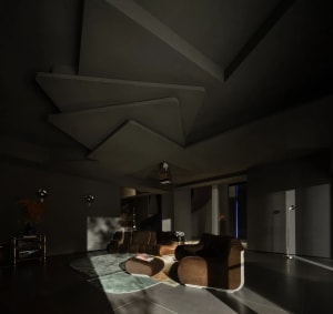Modern living room design featuring concrete and glass materials.