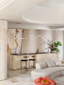 Modern residential interior with marble kitchen island and light wood furnishings.