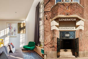 A modern hotel lobby featuring a green chair, a grey sofa, and a colorful abstract painting, connected to a brick building wi