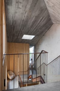 Concrete and wooden staircase interior