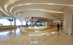 A sleek, modern retail space featuring a stylish marble counter.