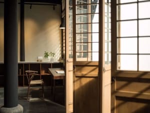 Minimalist office space featuring wooden elements