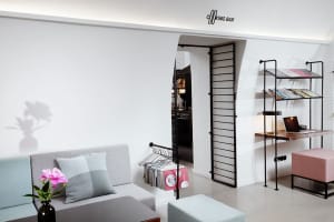 Modern interior living room featuring contemporary furniture pieces and minimalist design elements.