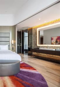 Modern luxury bedroom featuring metallic textiles