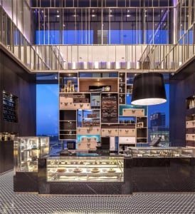 Retail store featuring metal, glass, and wooden elements