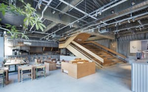 Industrial design restaurant with wooden counter and seating