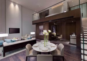 Modern residential living space featuring concrete and glass materials.