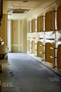 Industrial-style sleeping pods made of metal.
