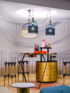 Modern bar counter featuring contemporary lighting design