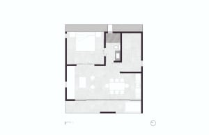A minimalist bedroom floor plan with a bed, dresser, and nightstand