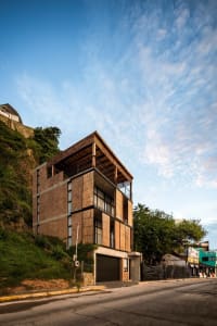 A modern house made of wood and concrete.