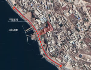 Satellite view of a city development project with highlighted boundaries and roads.