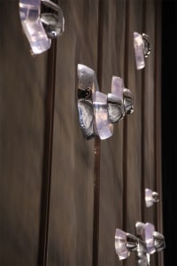 Modern interior design featuring metallic and acrylic decorations.